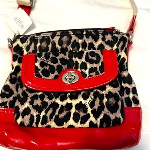 COACH crossbody cheeta print red pattern leather bag.
